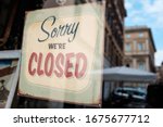 Small photo of SORRY WE'RE CLOSED shop window door notice board,abandoned shutdown cafe restaurant supermarket out of business,Coronavirus COVID-19 virus disease isolation quarantine,lockdown measure info concept,US