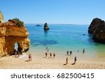 Scenic Camilo Beach (Praia do Camilo) at Algarve, Portugal with turquoise sea in background
