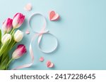 Convey heartfelt greetings on Woman's Day with picturesque arrangement: top view tulips, hearts, and a silk ribbon shaped into an 8, creating a celebratory scene against a soothing pastel blue surface