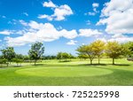Small photo of Golf course with blue sky background.
