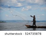 Fisherman Casting Fishing Net