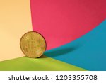 golden bitcoin coin on a... | Shutterstock . vector #1203355708