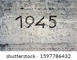 The year one thousand nine hundred and forty-five (1945) carved in stone. 