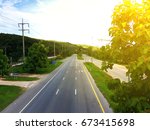 Scenic view of the four-lane road when viewed from a pedestrian overpass in Chiang Rai, Thailand.