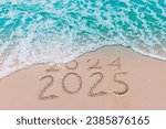 Message Year 2024 replaced by 2025 text written on beach sand background. Good bye 2024 hello to 2025 happy New Year coming concept.  top view.