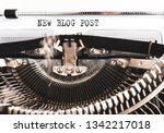 words NEW BLOG POST written on old manual typewriter