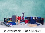 Small photo of Composition of different promo products -Thermo mug, mug, gifts, flash drive, pens, notebooks,tie,Lanyards Neck Strap,Keychain.