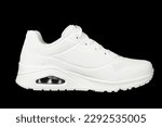 Side view of a white women's casual white sneaker.Isolate of sports shoes.