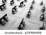 Small photo of Unutilized tables and chairs are seen on a terrace in Valais in Swiss Alps.