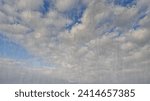 Small photo of cloudburst on sky with clouds - beautiful weather bg - photo of nature