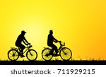 silhouette man and bike... | Shutterstock . vector #711929215