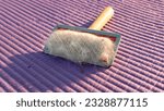 Small photo of slicker for cats, Hair Removal Comb. on yoga mat