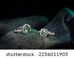 Engagement Emerald Rings on Natural Stone