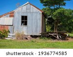 Small photo of A tumble down old tin shack in the country