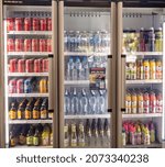 Small photo of Proserpine, Queensland, Australia - November 2021: Drinks fridge full of cold liquid refreshments and water
