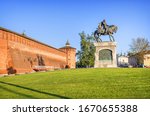 Monument to Dmitry Donskoy near the wall of the Kolomna Kremlin on a sunny summer evening