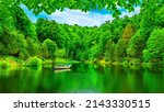 Small photo of Lake landscape in the forest. Lake view in spring. Nature landscape in green lake. boat on the lake in the forest. nature scenery background theme. Uludag mountain national park, Bursa, Turkey.