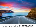 summer landscape on the highway. highway landscape at colorful sunset. Road view on the beach in summer time. colorful seascape with beautiful road. European highways. colorful nature landscape.