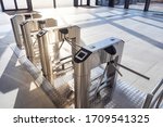 Small photo of Electronic turnstile. Access system to the building. Pass through the passes. Security systems for rooms. Several turnstiles are installed nearby. Check Point. Automatic checkpoint. Building security.