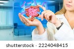Small photo of Bacteria around intestinal tract. Doctor womans with miniature intestines. Bacterial background of human intestine. Hands of doctor gastroenterologist. Concept of examination of digestive system
