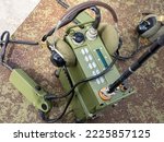 Small photo of Army connection equipment. Military radio. Field army communicative radio. Connection equipment for soldiers. Connection walkie-talkie with headphones. Communications equipment for army.