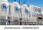 Small photo of energy company equipment. Tanks for hydrogen storage. Production of clean energy from hydrogen. Tanks contain H2 to create electricity. Hydrogen power plant.