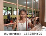 Small photo of one of the residents of the social cottage environment in Keputih when visited by a funder who wanted to have a close look at their condition (Surabaya, 30 October 2015)