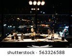 Dining table after dinner : dine fine restaurant. Table setting for celebration. Luxury table settings for fine dining with and glassware, beautiful blurred background. Preparation for holiday.