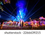 Outdoor night music party with laser lights and fire summer