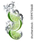 Lime Slices Falling Into Water