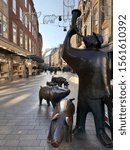 Small photo of Bremen, Germany-12 November 2019; The statue of Swineherd with dog and pigs in Bremen
