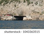 Small photo of Military submarine repair dockage since the USSR, tonel Balaklava. Black sea, Sevastopol.
