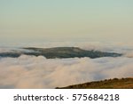 Low Cloud Over Rolling Hills