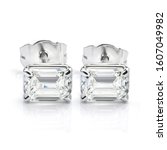 Small photo of Pair of Emerald Cut Diamond Solitaire Stud Earrings Isolated on White Background