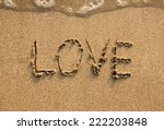 Love Written On Beach. 