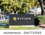 Small photo of Rivian sign logo at headquarters in Silicon Valley. Rivian Automotive is an American electric vehicle automaker and automotive technology company - Palo Alto, California, USA - 2021