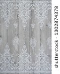the texture of lace on wooden... | Shutterstock . vector #1302874378