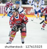 Small photo of VIENNA - FEB 3: International hockey game between Austria and Kazakhstan. Raphael Rotter on the attack for Team Austria on February 3, 2013 at Albert Schultz Halle in Vienna, Austria.