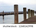 Wooden Dock Pier At Coastal...