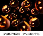 Glowing pumpkins levitate on a black background