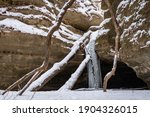 Frozen waterfall and snow in Kaskaskia canyon.  Starved Rock State Park, Illinois, USA.