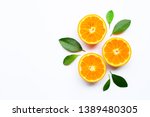 Oranges on white background. Copy space