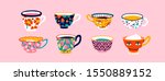 Set Of Various Cups With Tea Or ...