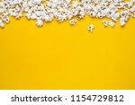 Popcorn On A Yellow Background