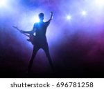 Silhouette Of Guitar Player In...