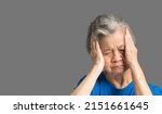Small photo of A senior woman who has a severe headache suffers from a stroke, brain attack, or migraines. Brain diseases problem cause chronic severe headaches. Aged people and healthcare concept