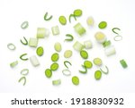 Isolated chopped fresh.  cut spring onions on white background. Top view. clipping path.