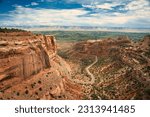 Colorado National Monument preserves one of the grand landscapes of the American West. curvy highway in the valley