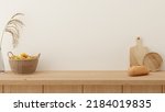 Small photo of Minimal kitchen counter mock up design for product presentation background or branding with wood counter white wall include vase with rice plant chopping block bread and fruit basket. Food table.