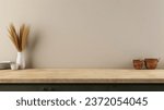 Small photo of Minimal cozy counter mockup design for product presentation background or branding with bright wood top green counter concrete wall with vase plant dish mug bowl basket. Kitchen interior 3D render